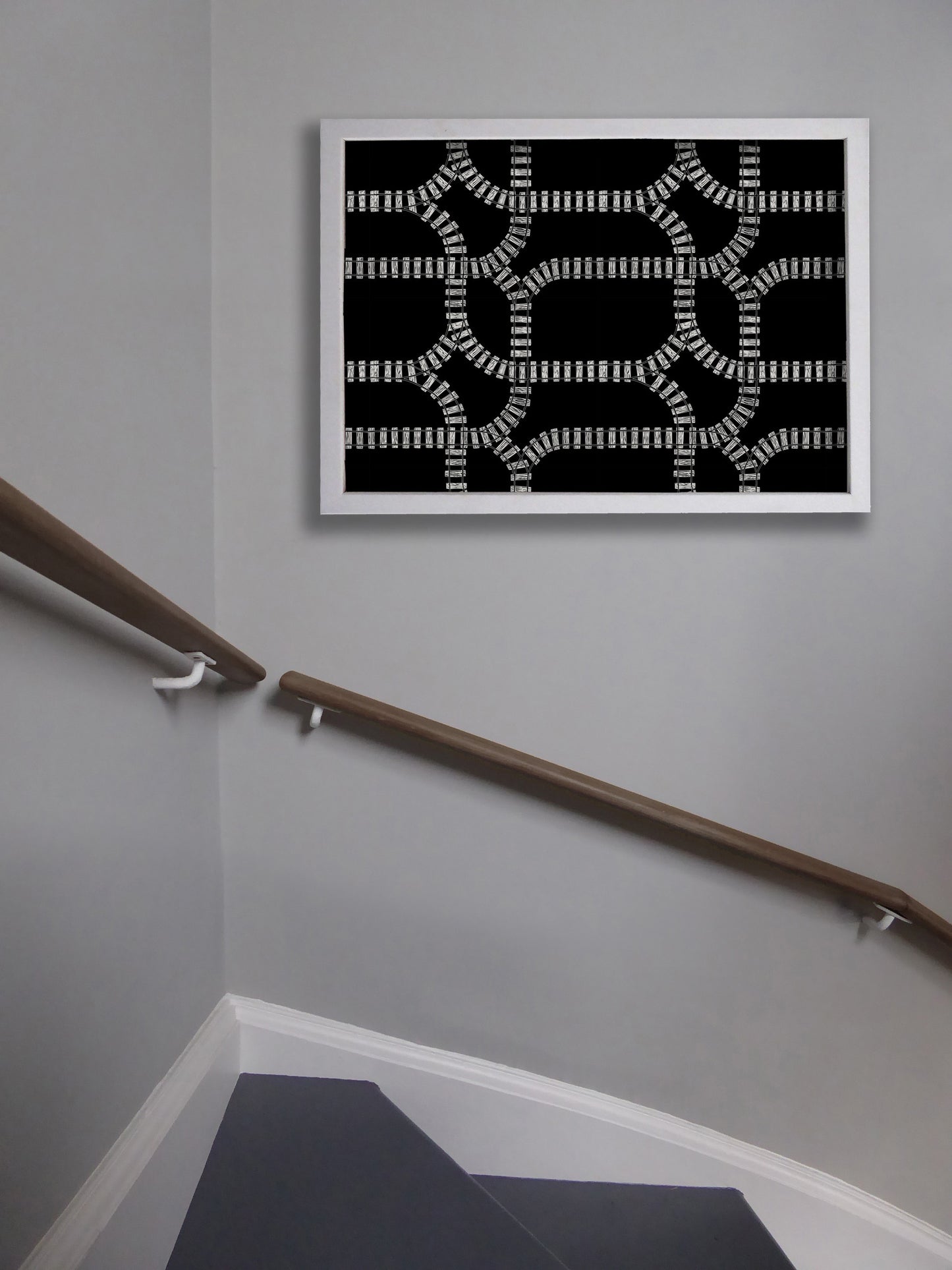 Train Tracks Statement Print Hanging in Stairwell