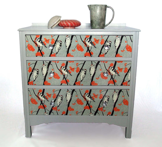 woodpecker and orange berries wallpaper