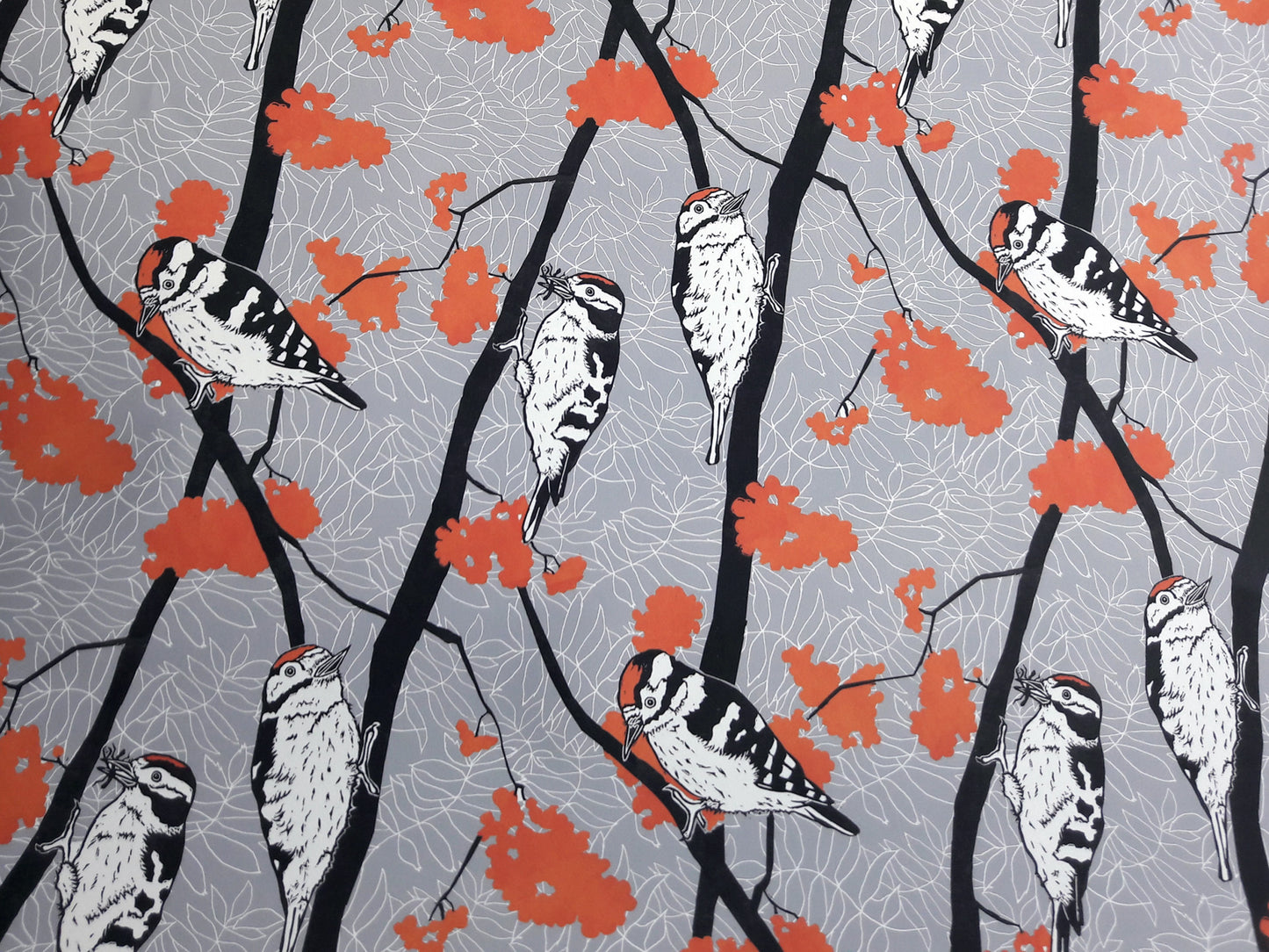woodpecker and orange berries wallpaper