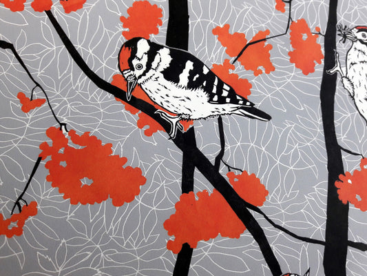 woodpecker and orange berries wallpaper