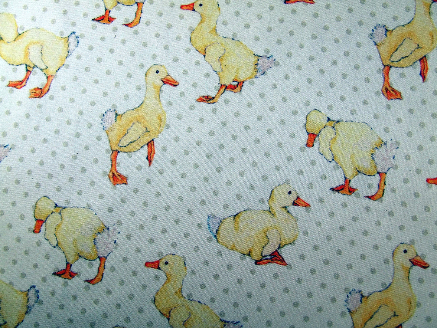 Yellow Duckling on Grey Polka Dot Fabric